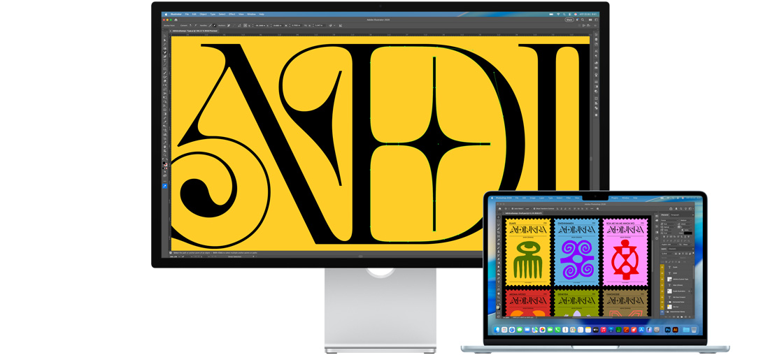 Studio DisplayとMacノートブック。複数のAdobeプログラムで作業中のプロジェクトが表示されている。Studio Displayには、深みのあるイエローの背景上に書かれたブラックのテキストが拡大表示されている。反射防止コーティングが映り込みを抑えている