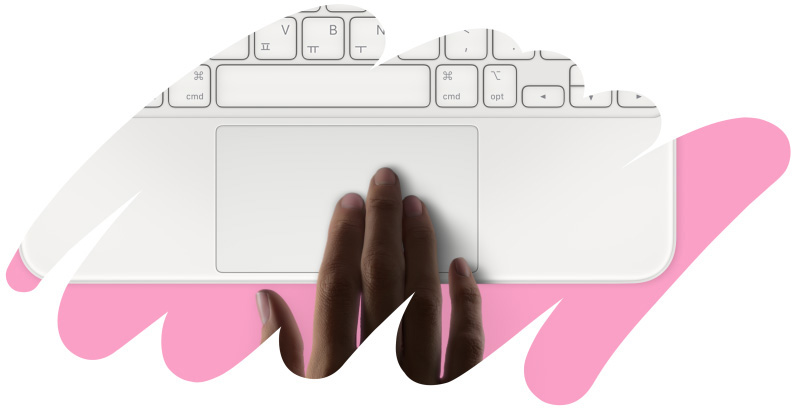 손으로 Magic Keyboard Folio 트랙패드를 다루는 모습