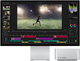 „Studio Display XDR“ su integruotu stovu, „Mac Studio“ tvarkingai telpa po ekranu, ekrane rodomas vaizdo įrašų redagavimo ir spalvų korekcijos įrankių darbas