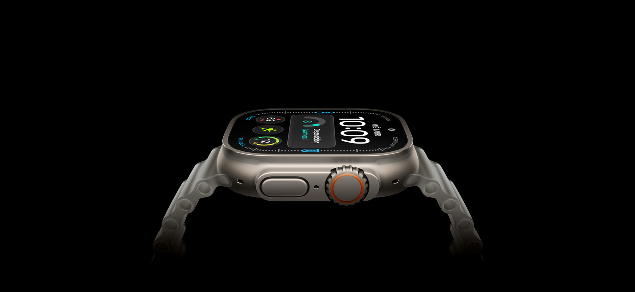 Apple Watch Ultra 4, caja de titanio, color natural, parte lateral derecha, Digital Crown, botón lateral en relieve, carátula digital, correa Ocean gris translúcido