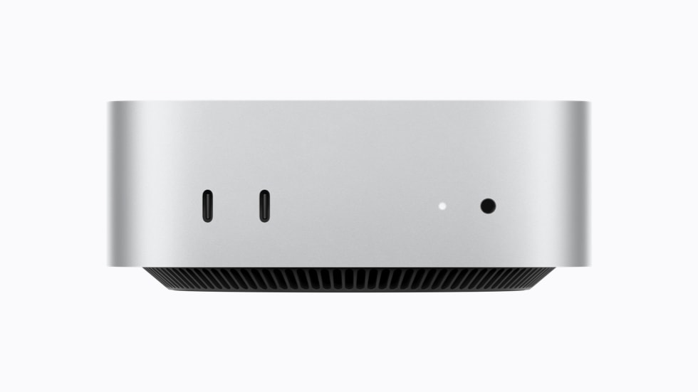 Die Vorderseite des Mac mini mit den zwei USB‑C Anschlüssen, die USB 3 unterstützen, und einem Kopfhöreranschluss.