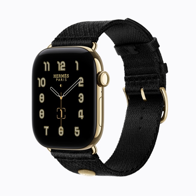 Apple Watch Hermès Series 12 avec bracelet Satin clou de selle noir.