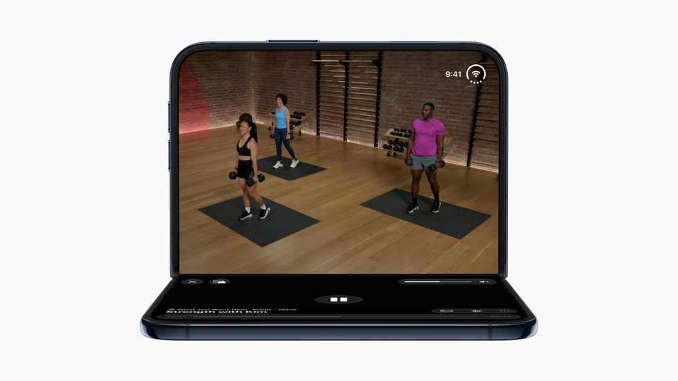 Apple Fitness+ is displayed on iPhone Duo while folded.