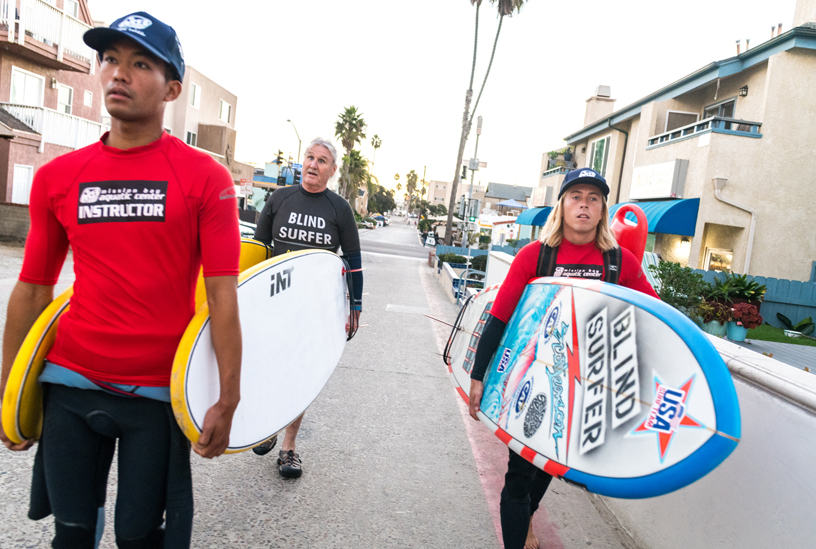 Leason and his coaches Gary Lau (left) and DJ Tompkins head for Mission Beach.
