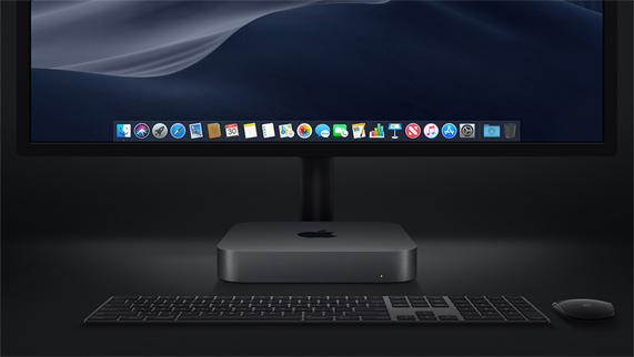 Mac mini met Magic Keyboard, Magic Mouse en display.