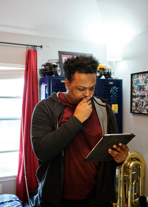 Rhys Richard at work using iPad Pro.