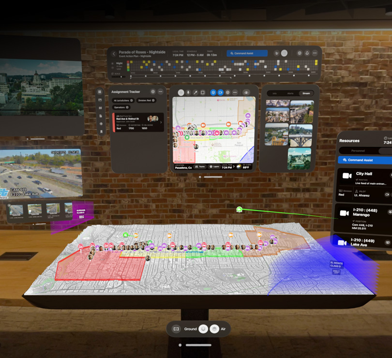 Multiple digital dashboards float with aerial views of Pasadena, a 3D map of the city, live video feeds, and resourcing plans