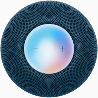 Der HomePod mini in Blau von oben, mit den Plus- und Minustasten zur Lautstärkeregelung auf einem bunten Display.