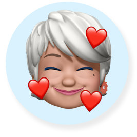 微笑表情 Memoji，一位白色短髮的年長女性
