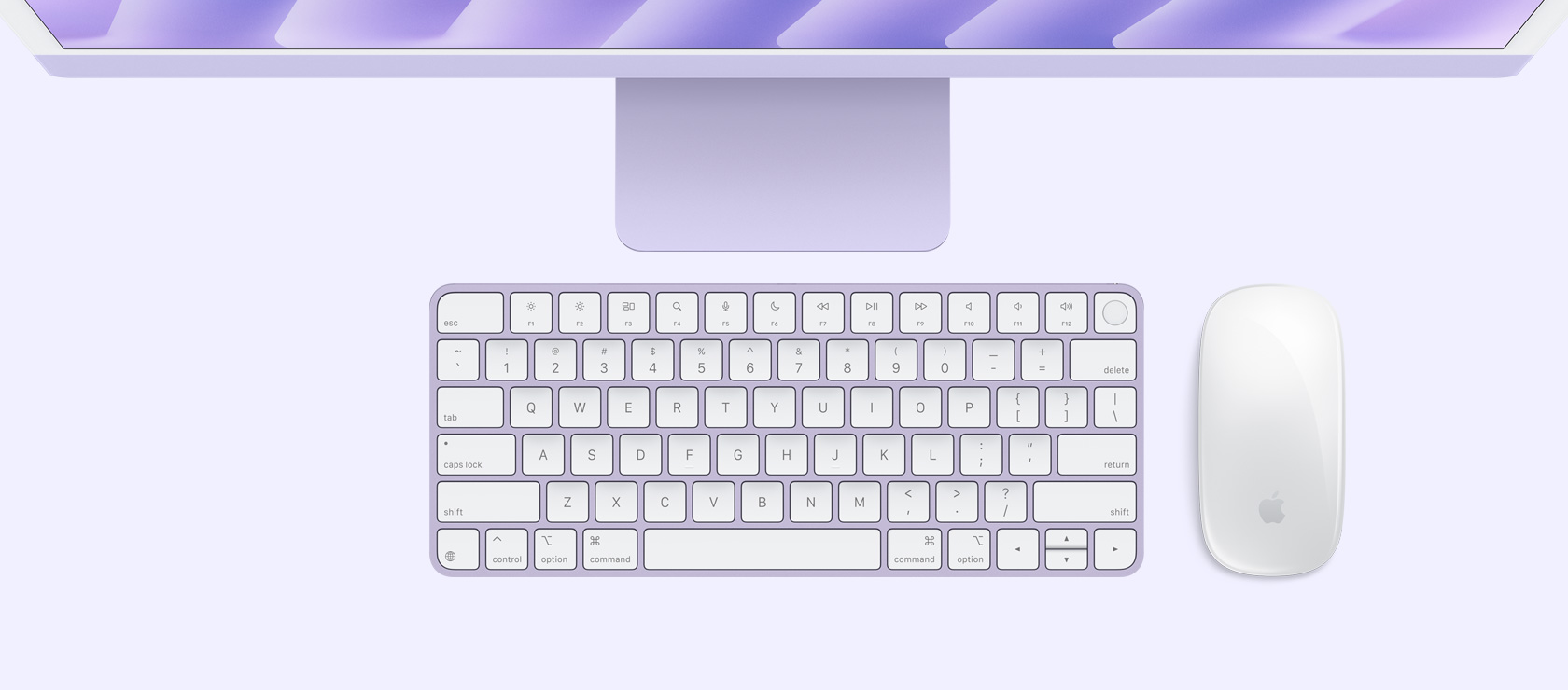 Violetinės spalvos „iMac“ vaizdas iš viršaus su spalvą atitinkančia pele ir klaviatūra