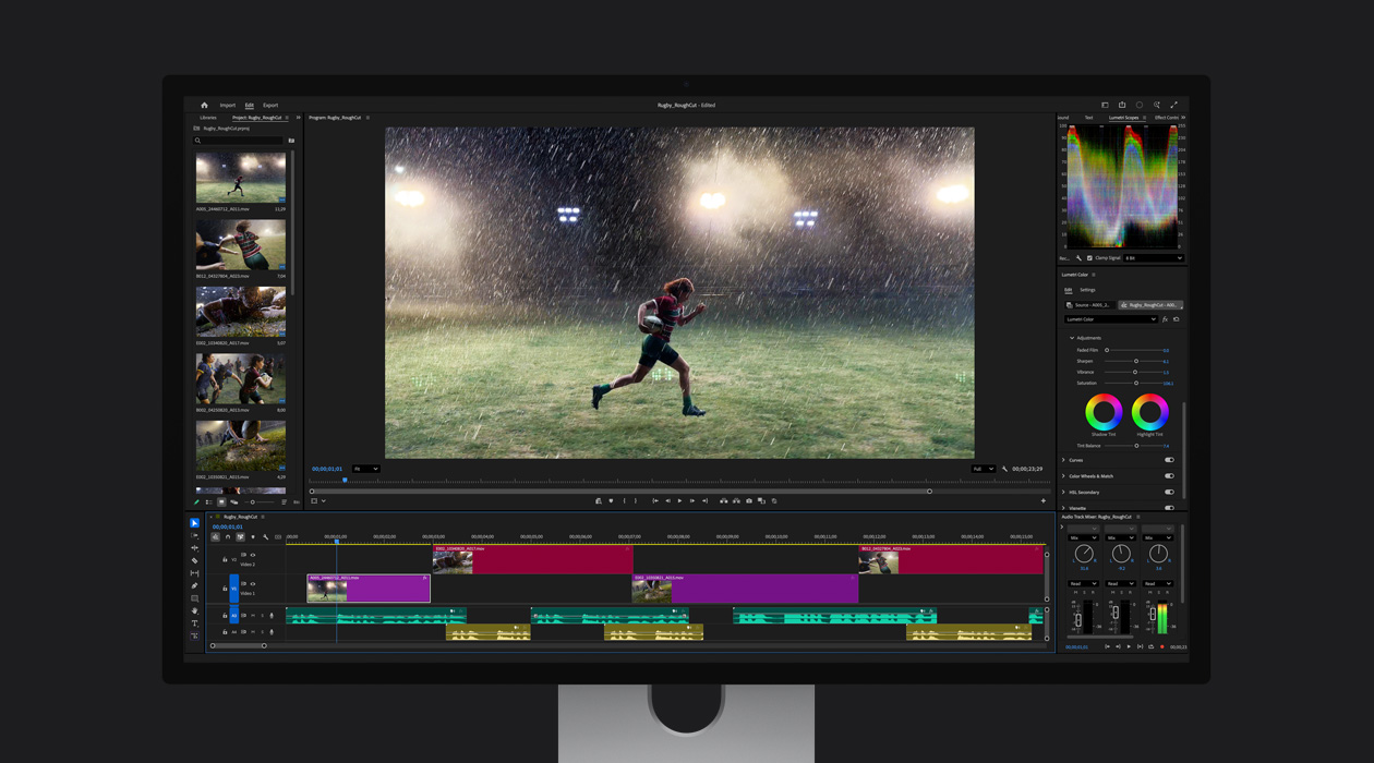 In an Adobe Premiere Pro file, a rugby player runs across a field in the rain 